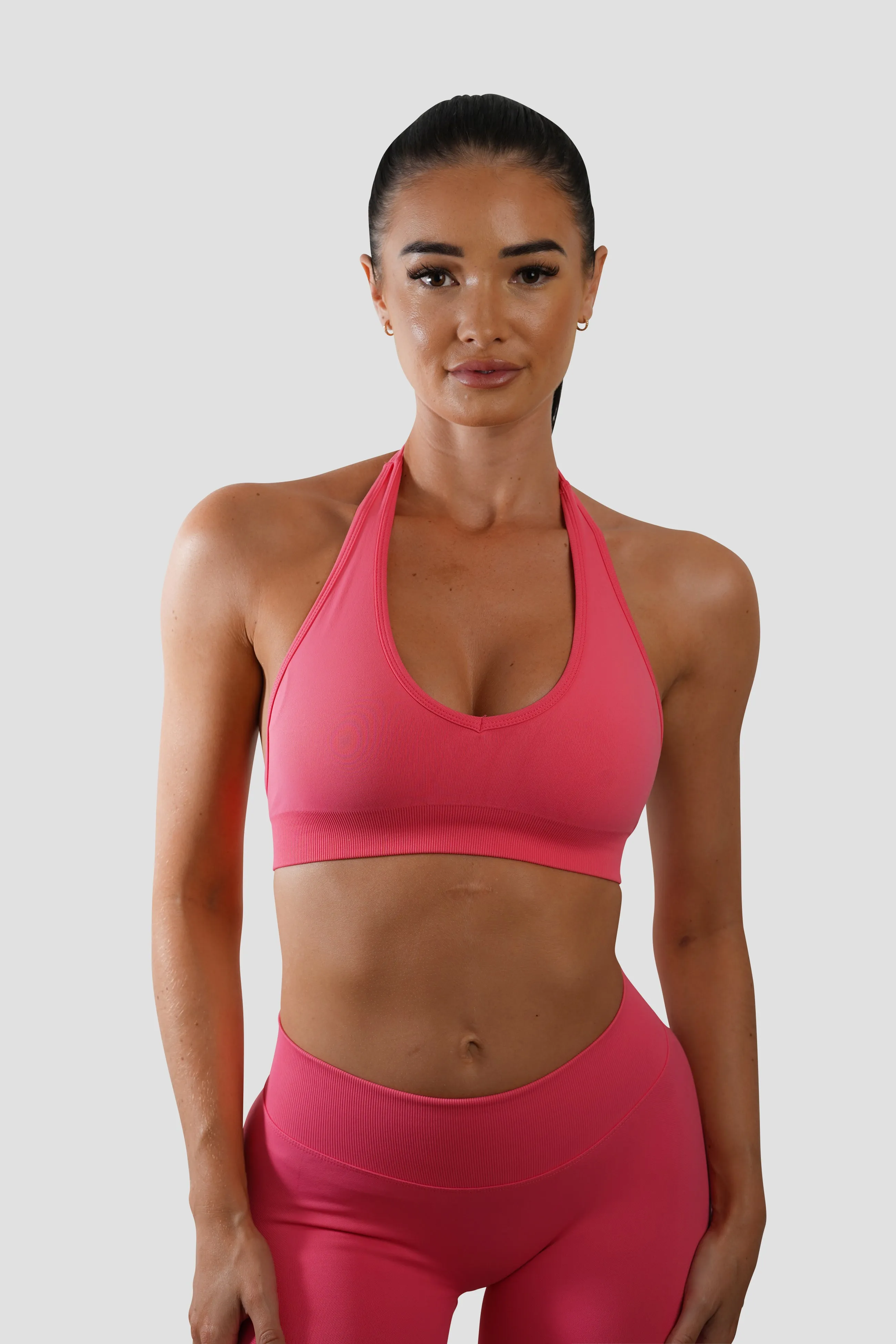 RECOIL HALTER CROP- DARK CORAL